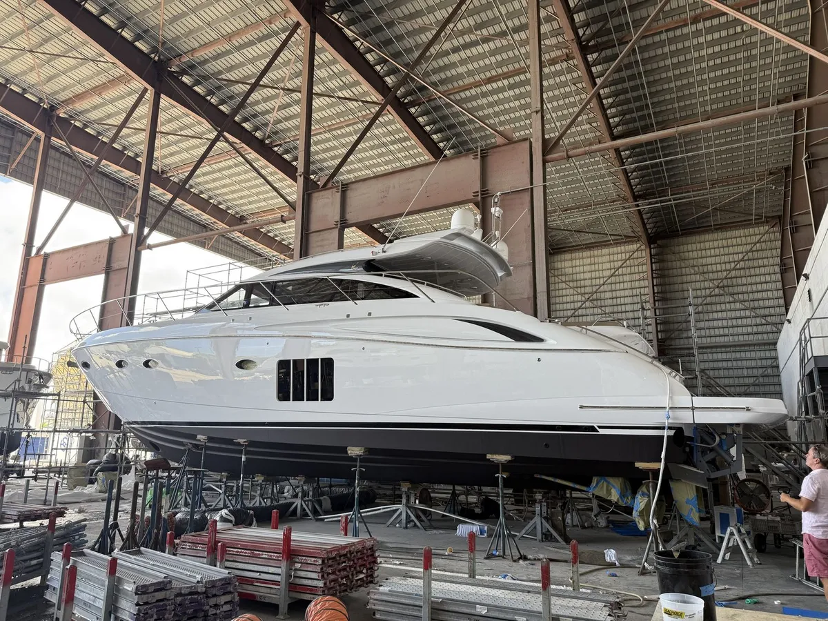Princess V65 with finished hull and superstructure paint under cover at Lauderdale Marine Center