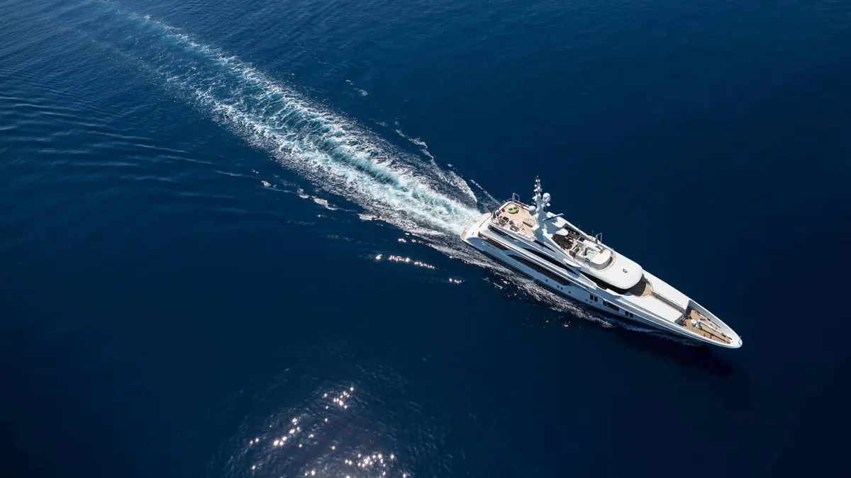 Superyacht underway at speed