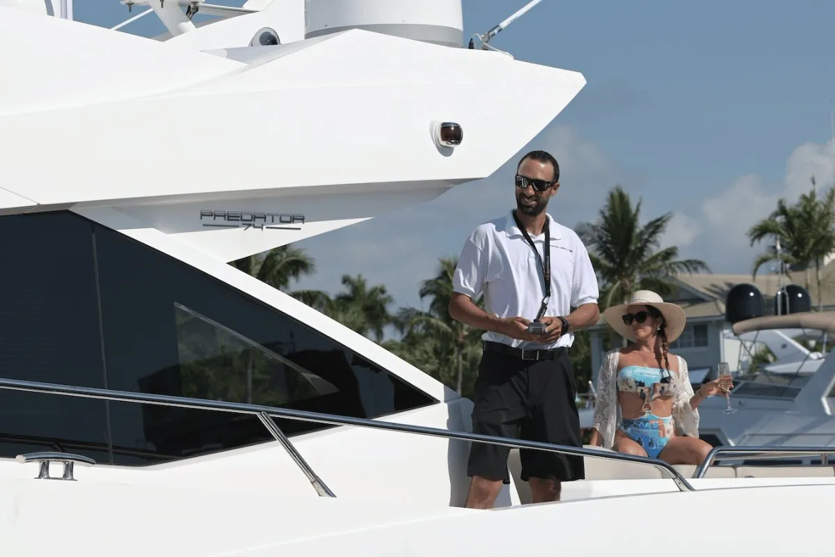 Captain docking a yacht from the side deck with a Dockmate remote