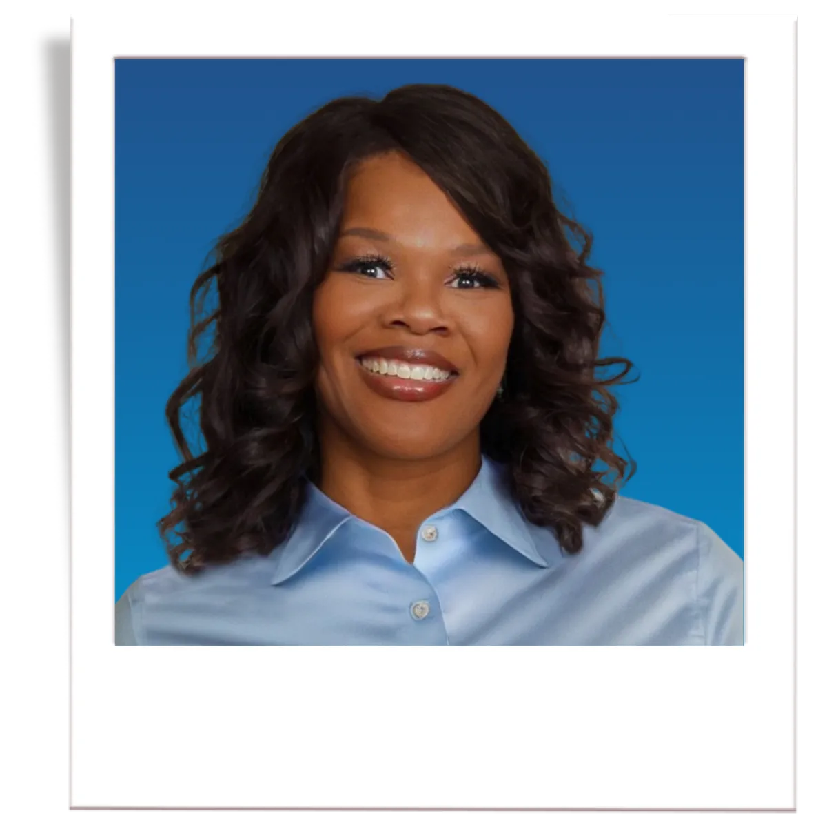 A picture of professional insurance agent, Noe Recendez. The picture is in the style of a polaroid. The insurance agent is wearing a dark grey men's blazer, a blue button down shirt, and a black tie. The agent is in front of a blue gradient background. 