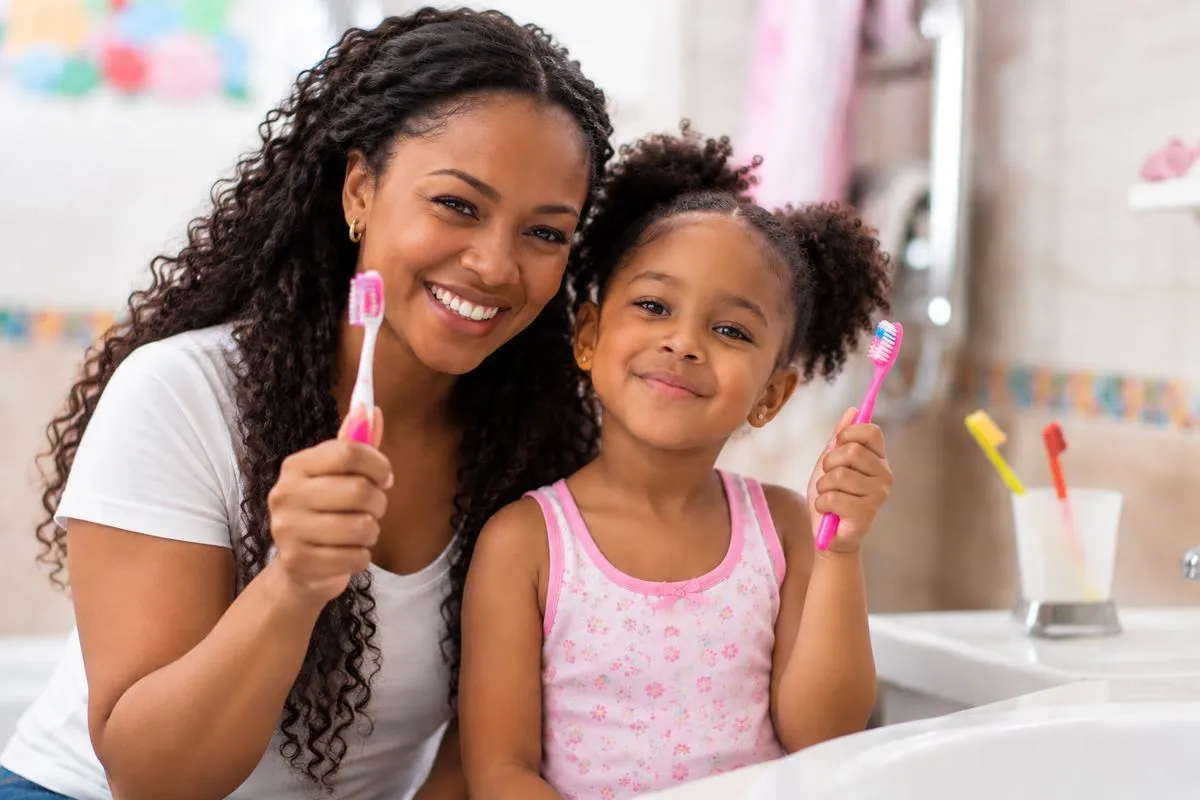 Child receiving supportive dental care at a pediatric dental office