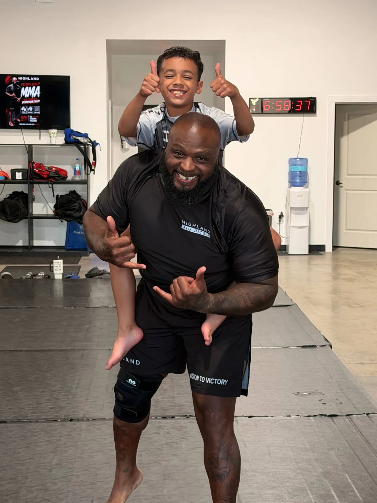 Brazilian Jiu Jitsu practitioners demonstrating precise technical discipline on pristine white academy mats with natural lighting