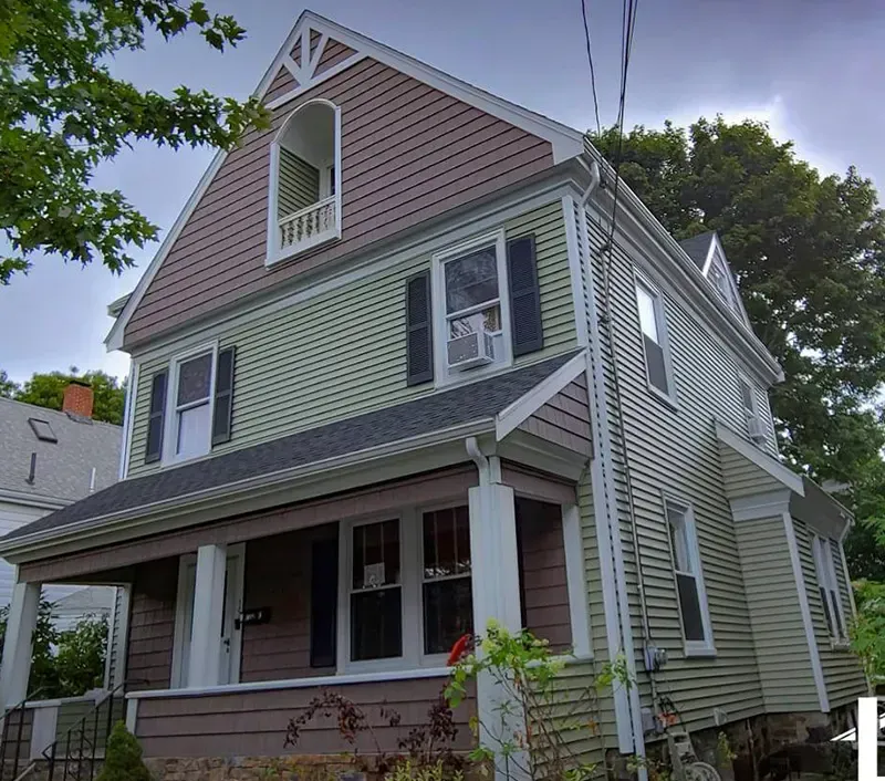 Home featuring professionally installed gutters protecting walls and foundation