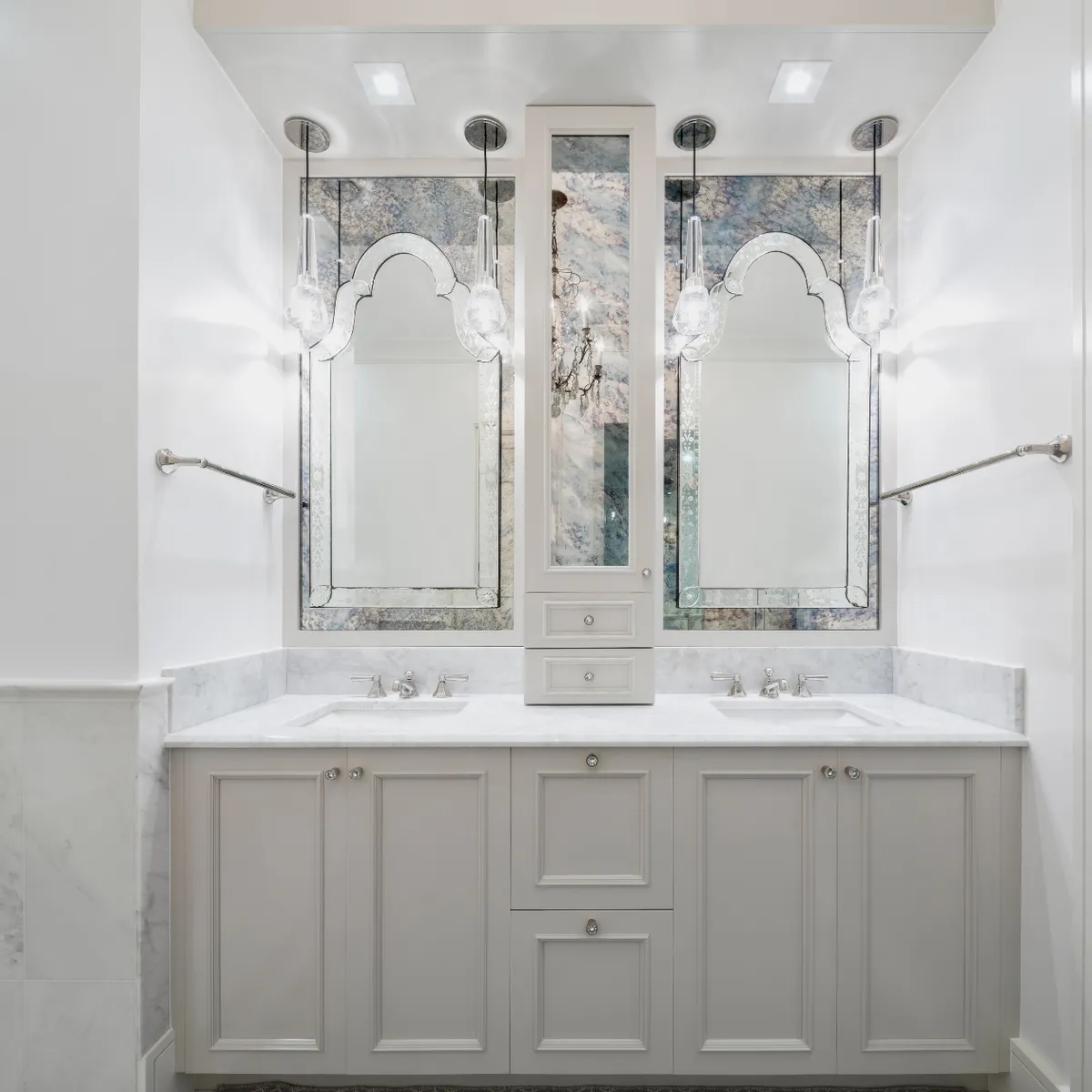 Custom bathroom renovation in the Houston area (Katy, Texas) showcasing a double vanity, framed mirrors, and bright modern finishes.