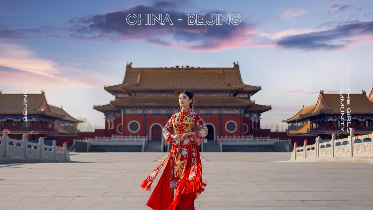 a building on a hill with a sunset in the background
