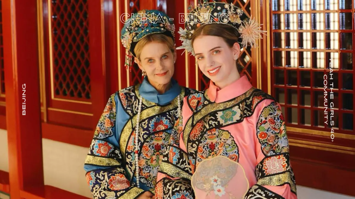 a building on a hill with a sunset in the background