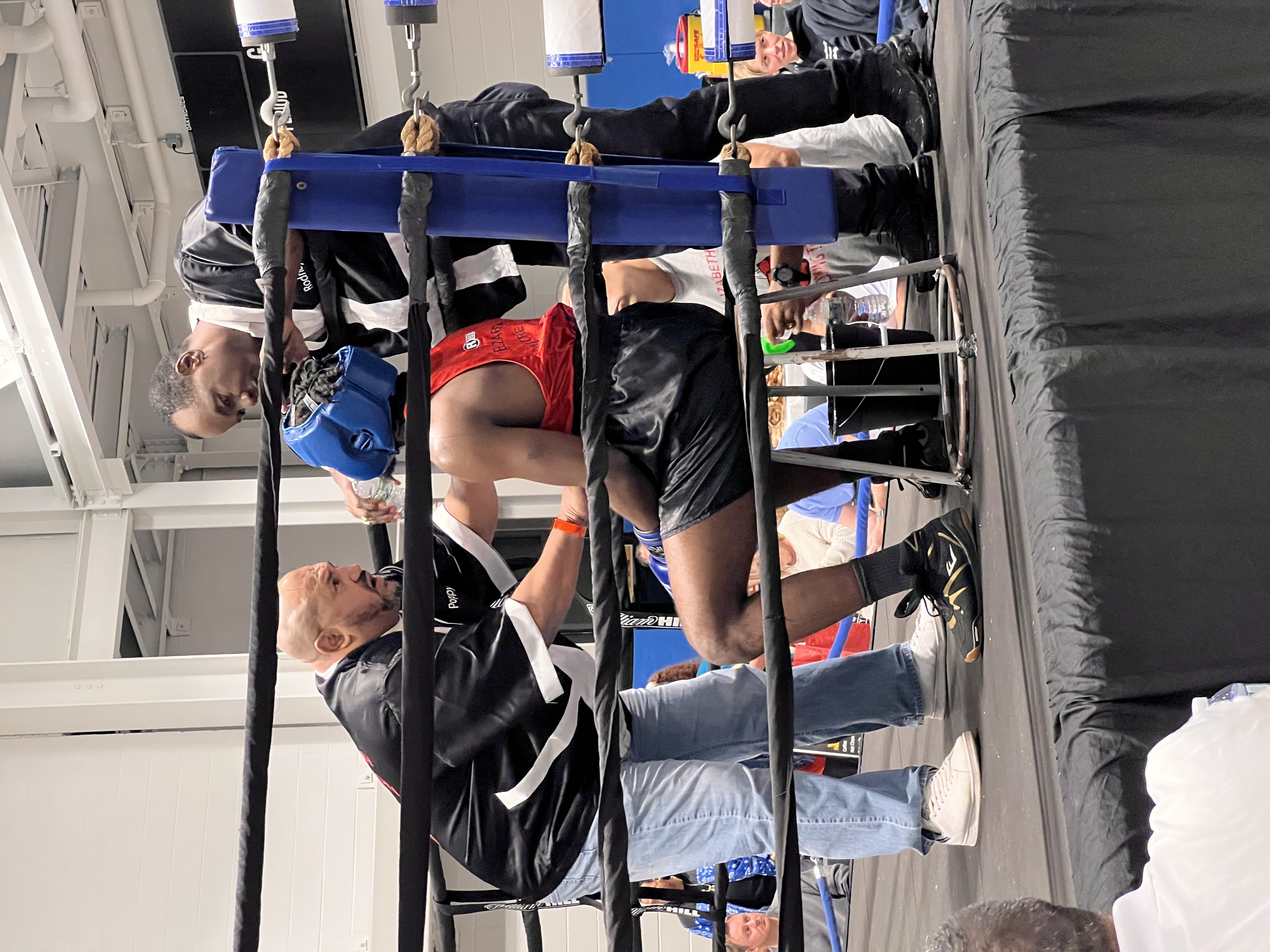 man in red and white boxing gloves