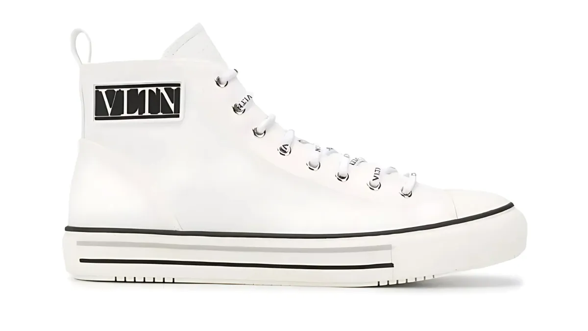 pair of brown-and-white basketball shoes