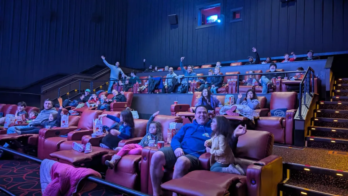 Group of dads in business high-fiving