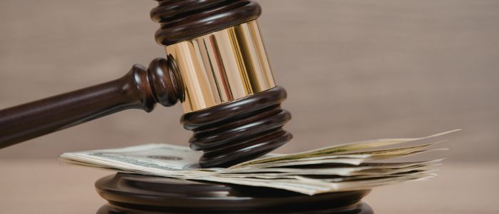 The Hidden Cost of NOT Sweeping Your Parking Lot (Fines, Lawsuits & Repairs)