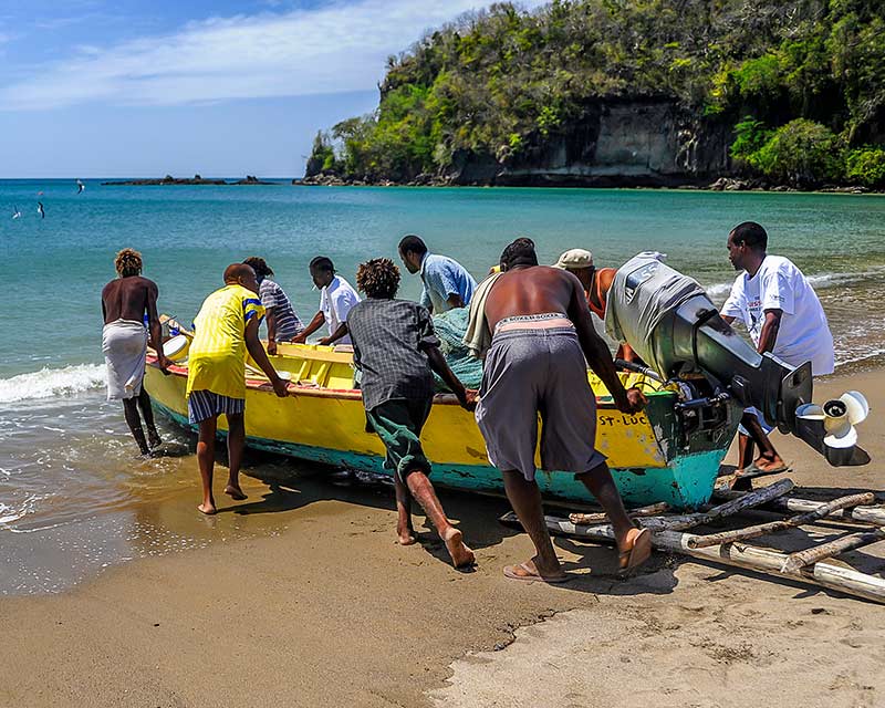 Fishermen Launching Boat in Saint Lucia Caribbean Village Life