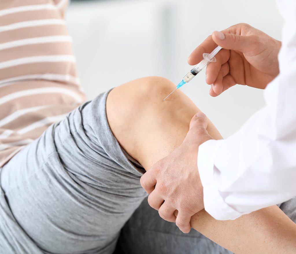 Close-up of cortisone injection for inflammatory joint pain