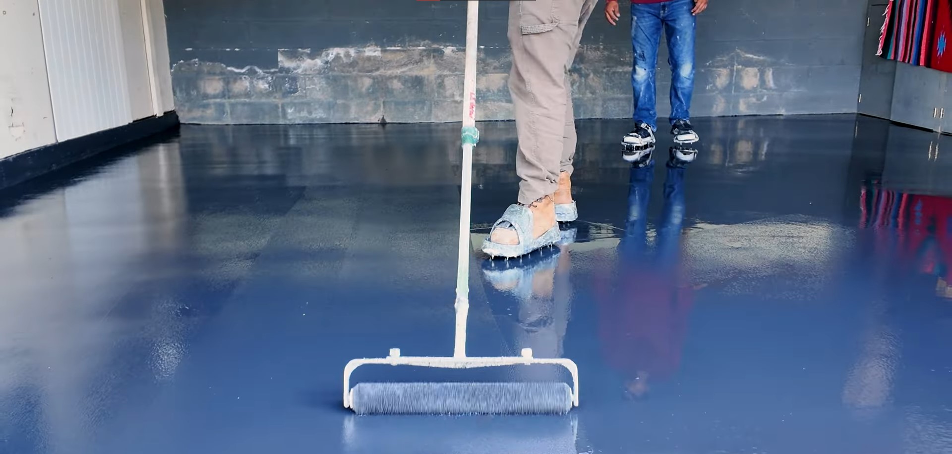 rolling dark grey blue epoxy coats