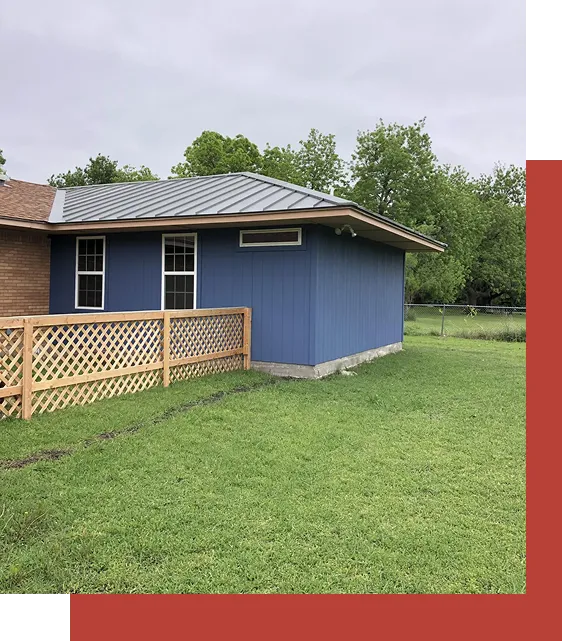 Custom home addition with blue siding in Carrollton Texas