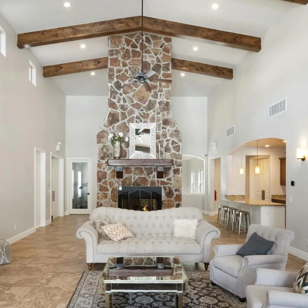 Home addition in Denton TX with expanded living room and custom stone fireplace