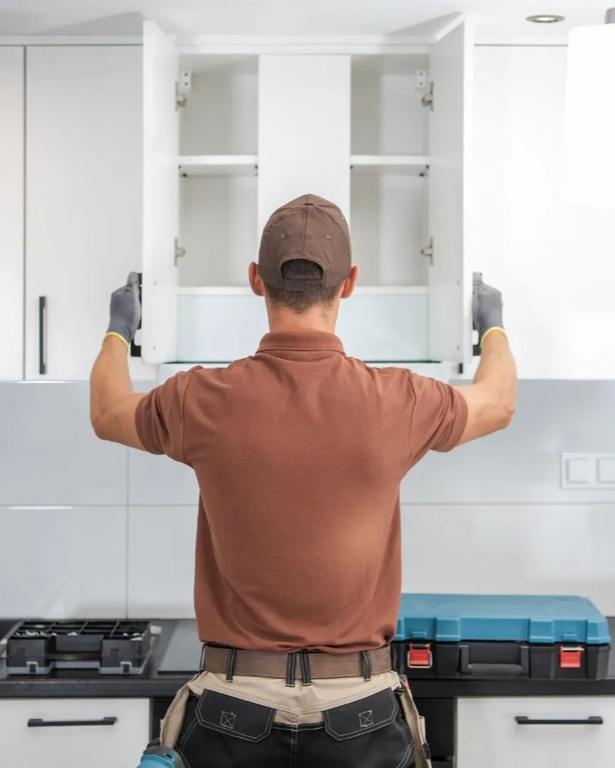 Licensed contractor in Denton TX remodeling kitchen with new cabinetry and modern layout