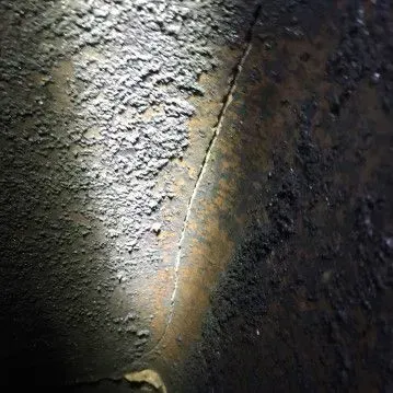 This liner has a crack from Thermal Shock, a problem Chimney Works can address.