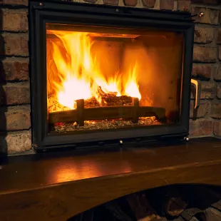 Modern gas fireplace installed in Cincinnati living room, enhancing warmth and home comfort