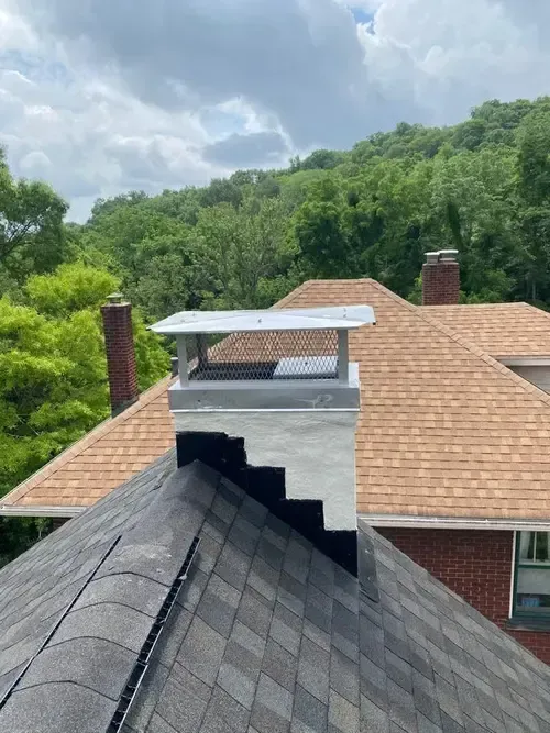 Chimney without cap allowing water entry.