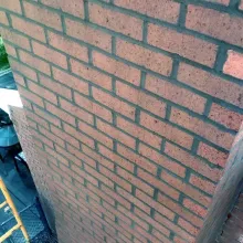 Restored brick chimney with professional tuckpointing by ChimneyWorks in Cincinnati—clean mortar joints protecting against moisture and structural damage.