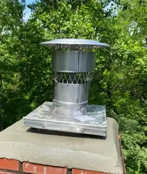 Single-flue chimney cap installation on a Cincinnati home — installed by ChimneyWorks to prevent moisture and critter entry