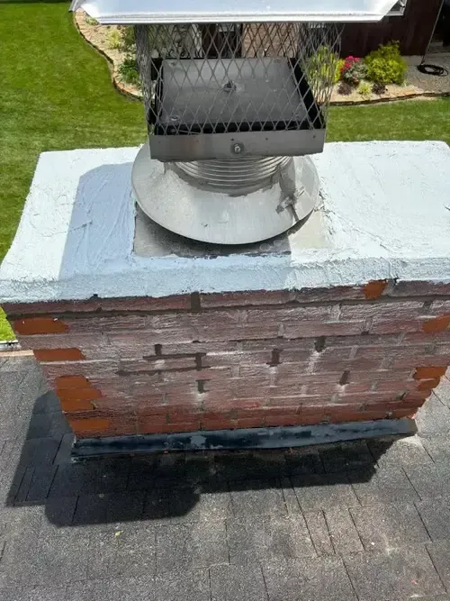 Finished leaking chimney repair by ChimneyWorks in Hebron, Kentucky showing a fully sealed and restored chimney.