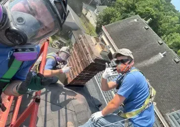 Chimney Works professionals performing expert chimney repairs to ensure safety and functionality.