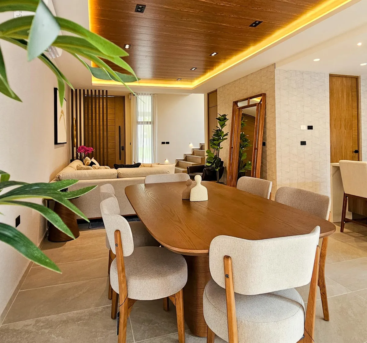 a modern house with a pool in the middle of the yard