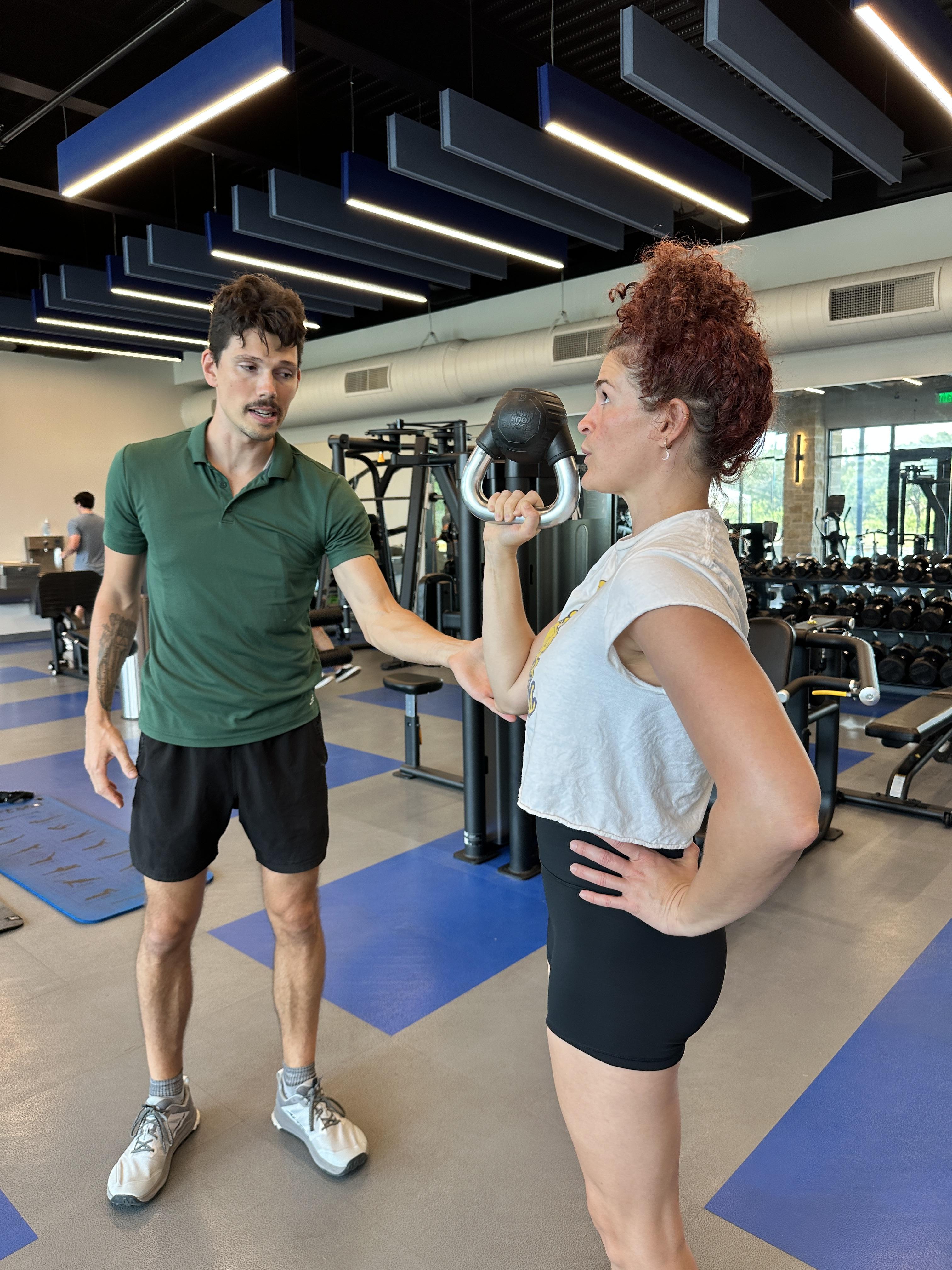 three person lifting barbels