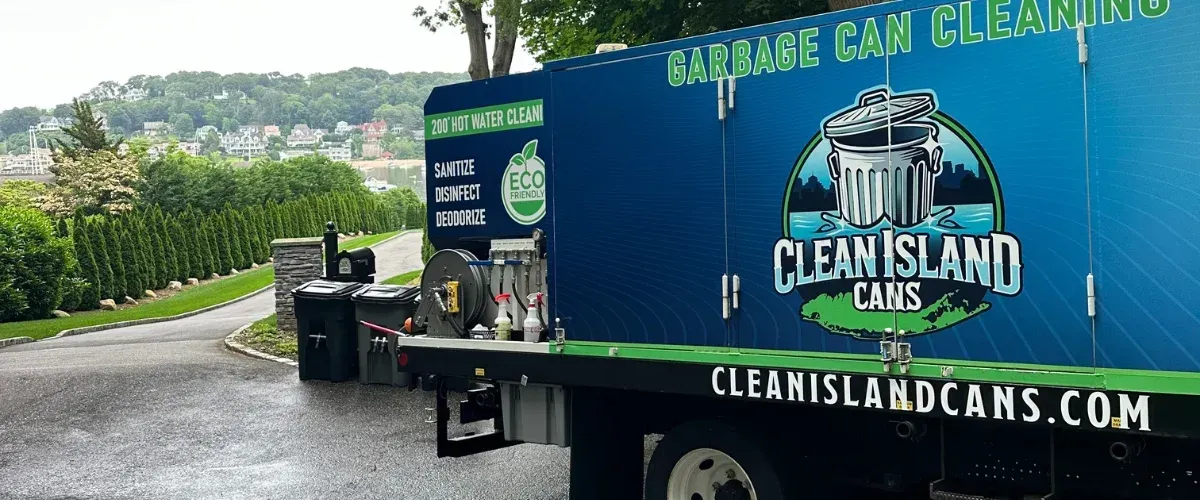 Garbage can cleaning truck parked in residential neighborhood