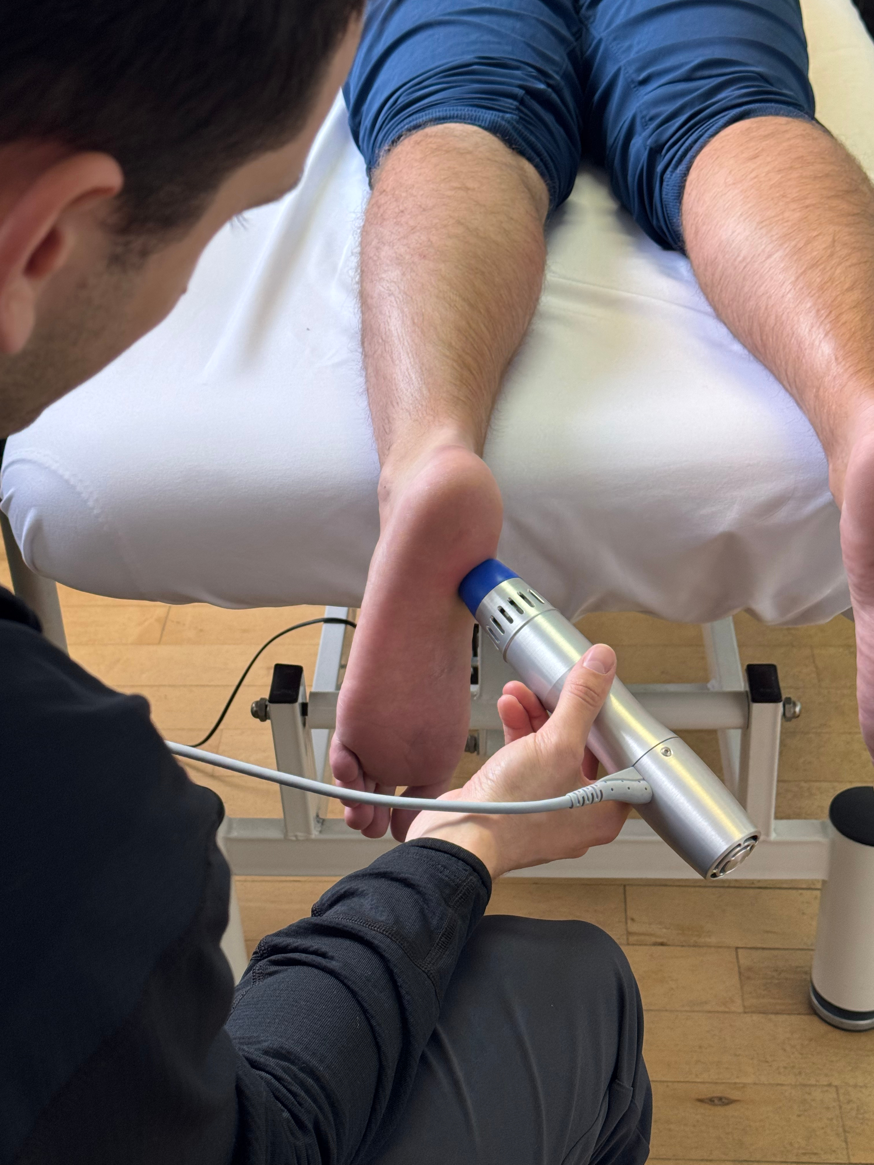 a group of people doing yoga in a room