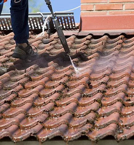 Worker Power Washing
