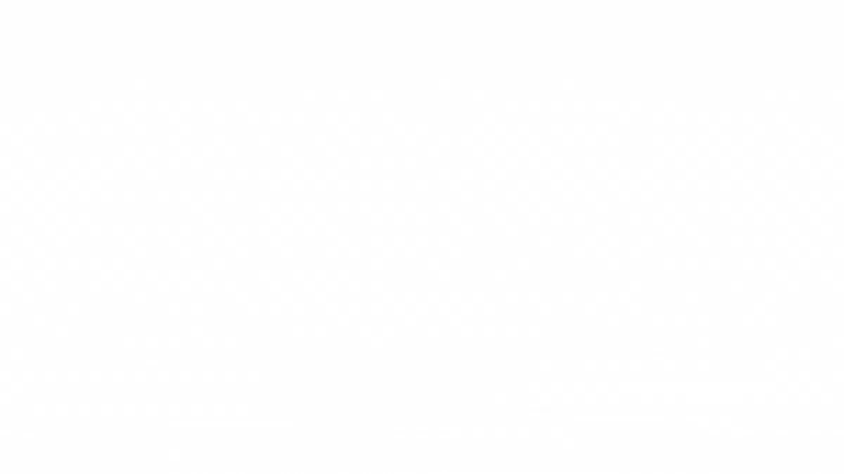 Small green plants growing by a wooden beam.