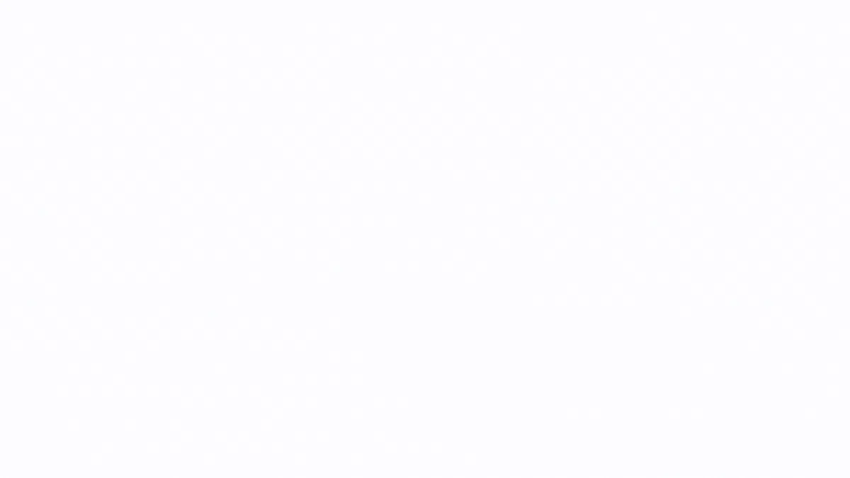 a close up of a purple flower with a yellow center