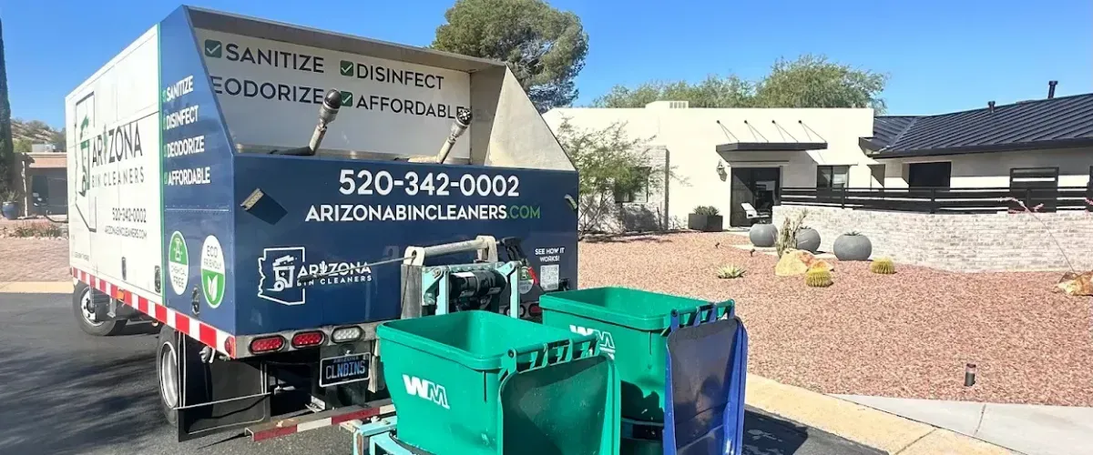  Arizona Bin Cleaners service truck cleaning trash bins in a residential neighborhood.