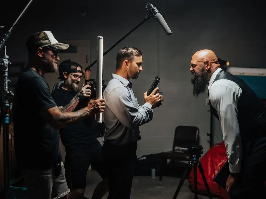 Film crew recording two men during a video production shoot