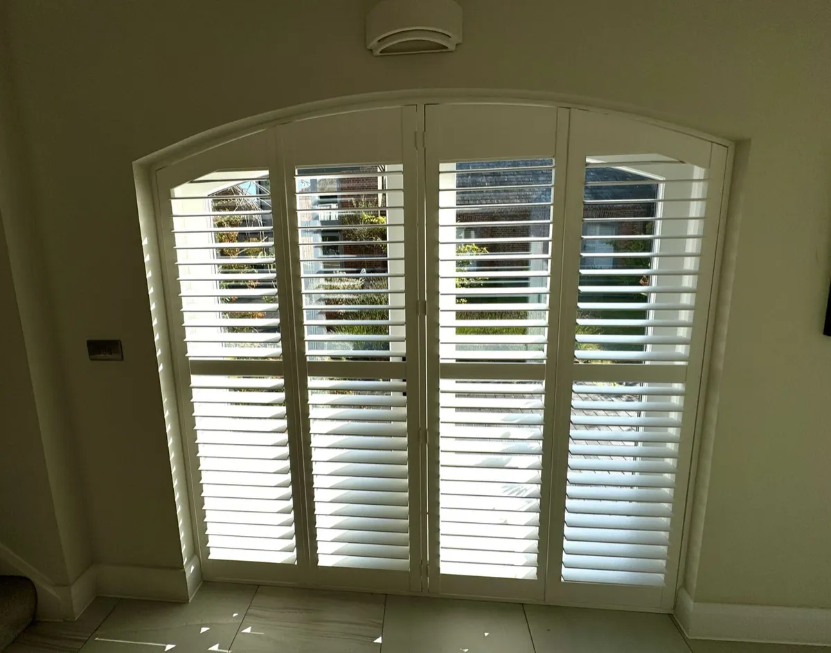 Track shutters across patio doors in Cobham