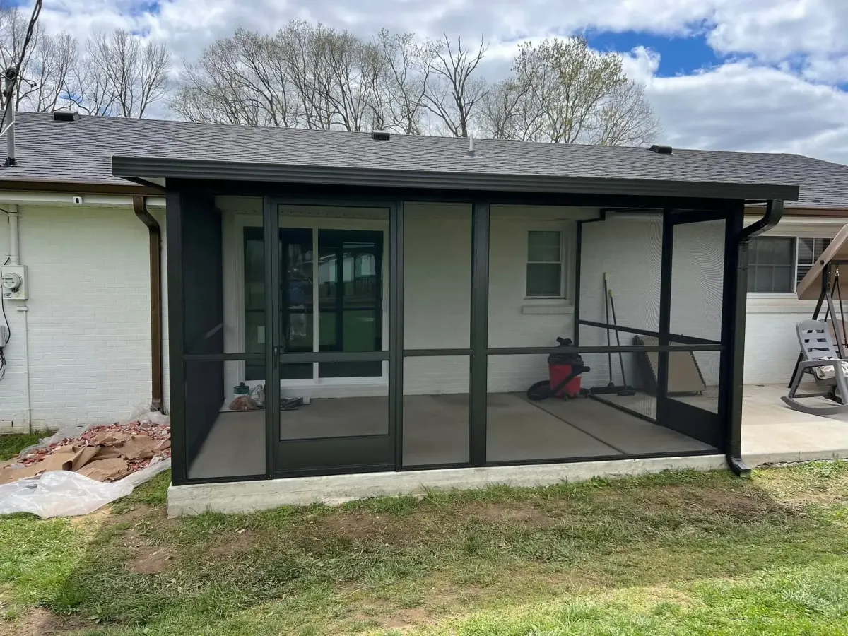 Custom screen room addition with solid roof installed by JB's Enclosures in Murfreesboro TN.