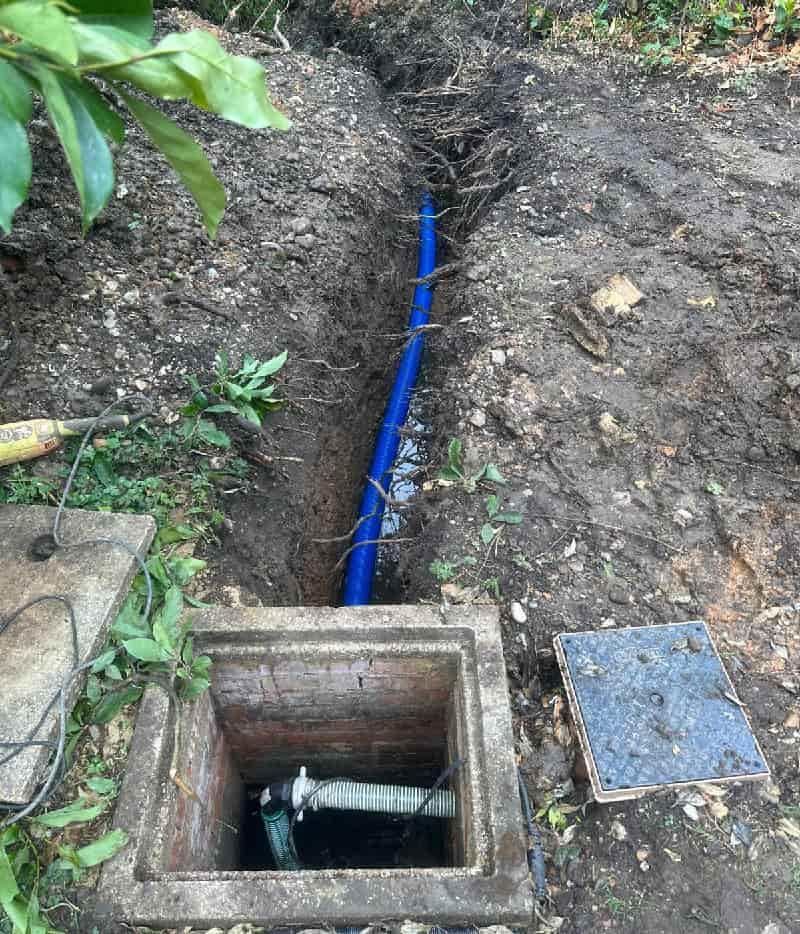 I'll create appropriate alt text for this drain repair image that incorporates your specific keyword: "Excavated drain repair in Bournemouth performed by 1st Call Drainage specialists.