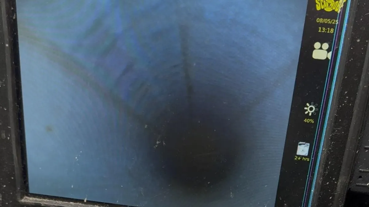 Internal view of newly installed CIPP liner inside renovated drainage pipe.