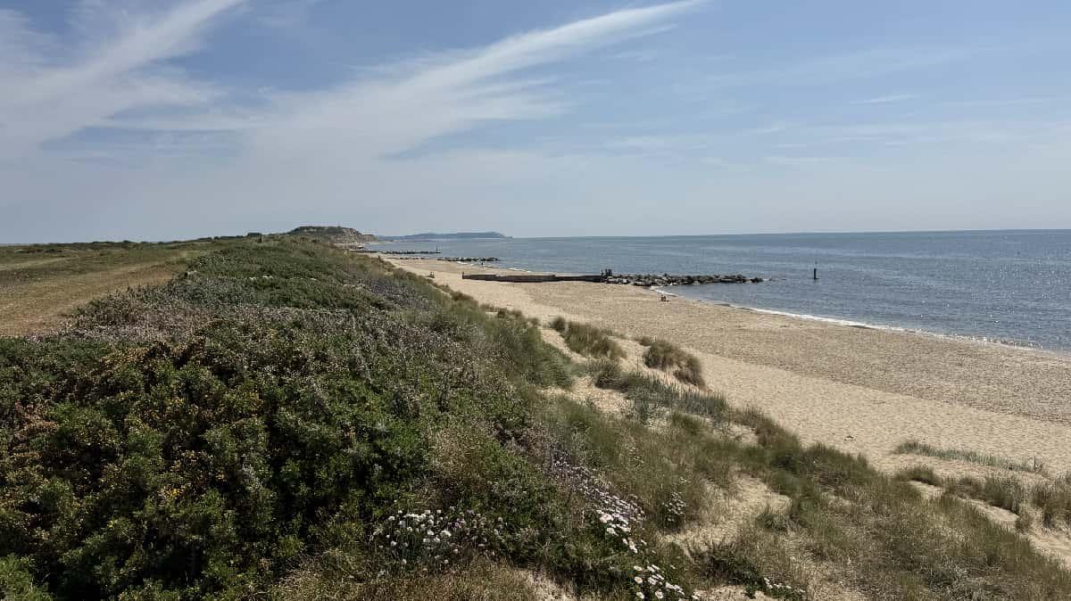 Scenic view of Hengistbury Head coastline showing the natural headland and shoreline.