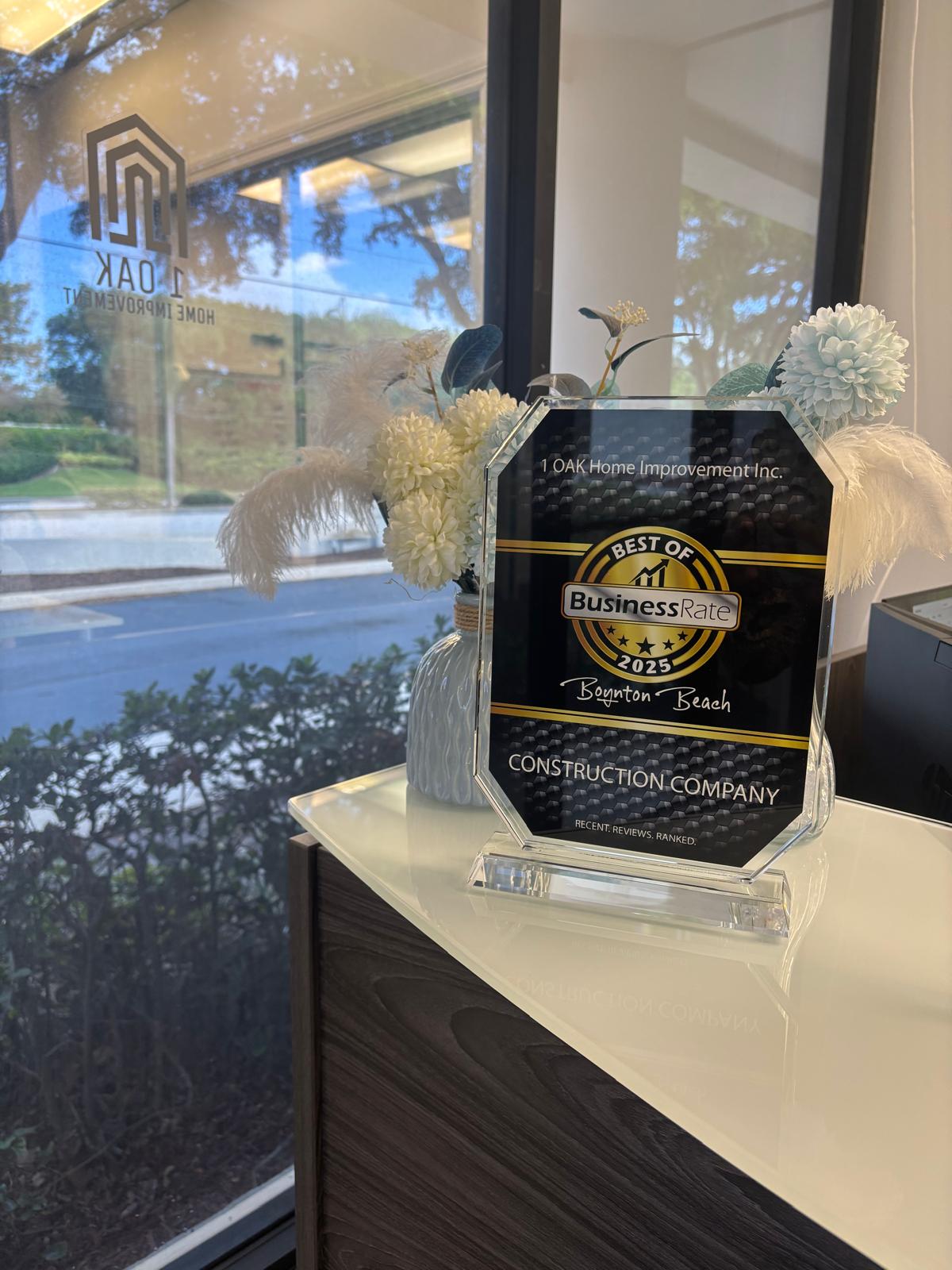The roof of a building with a tree in the background
