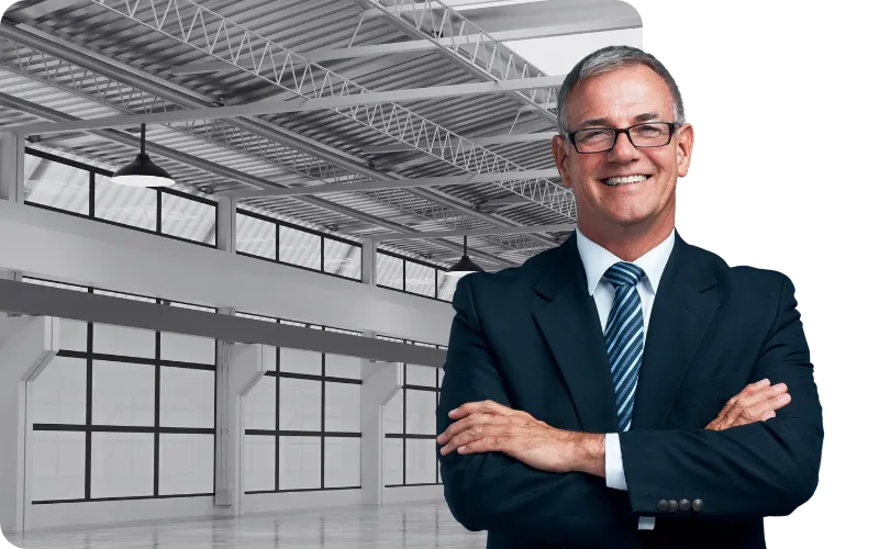 Smiling commercial property owner consulting with RSTM Properties about 1031 exchange and tax-deferred exit strategies.