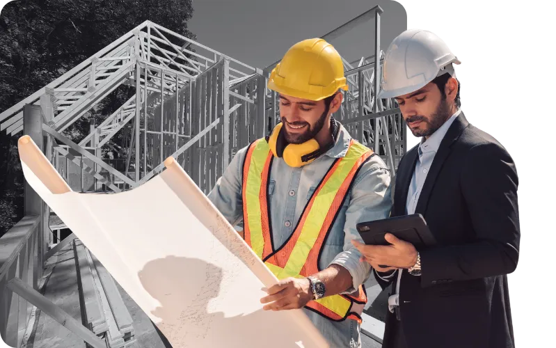 Developers reviewing construction plans for joint venture and redevelopment projects with RSTM Properties in Southern California.