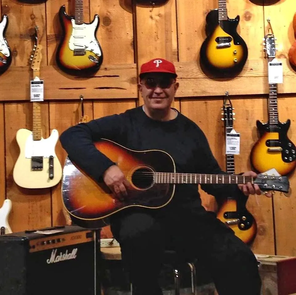 World music producer collaborating in studio