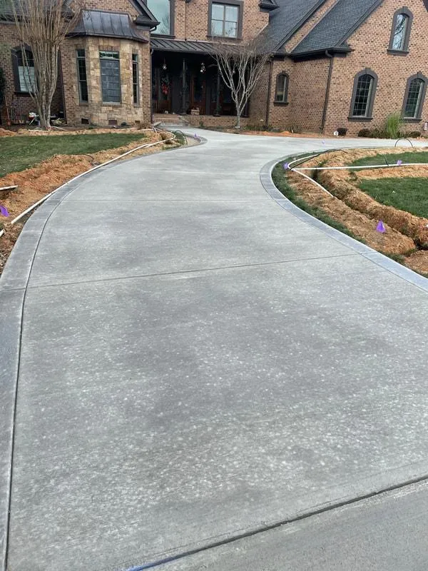 Concrete sidewalk being poured