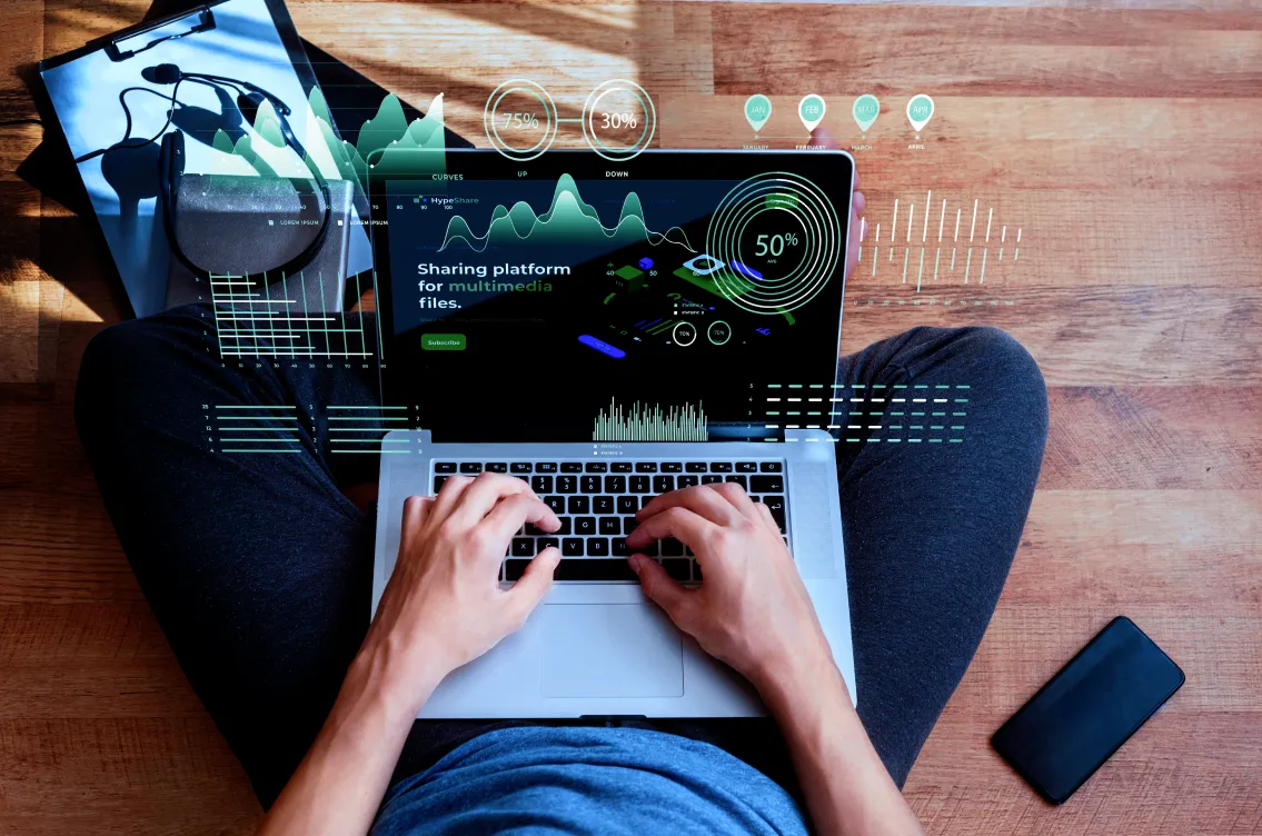 man's lap with a laptop displaying tecnical nfo in it;in 4D with wooden bg
