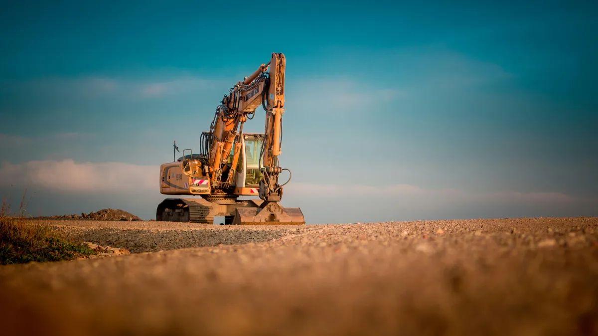 Heavy equipment operator working on an active construction site