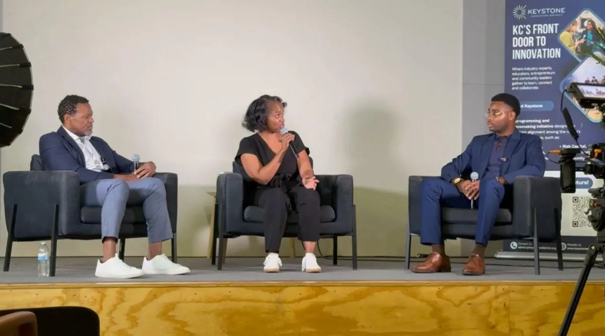 man in white dress shirt sitting beside woman in black long sleeve shirt