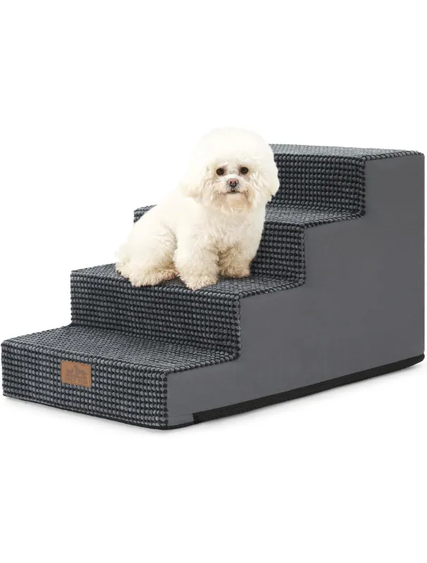 White fluffy dog sitting on gray incline pet stairs designed for small dogs, featuring a non-slip surface and gentle step height for easy access to furniture.